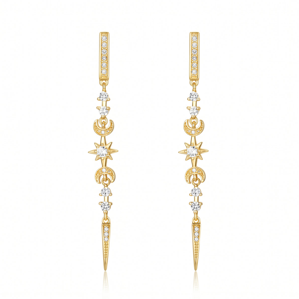 A pair of gold dangle earrings with clear gemstones forming celestial motifs including stars, crescent moons, and a vertical bar at the top, displayed on a clean white background.