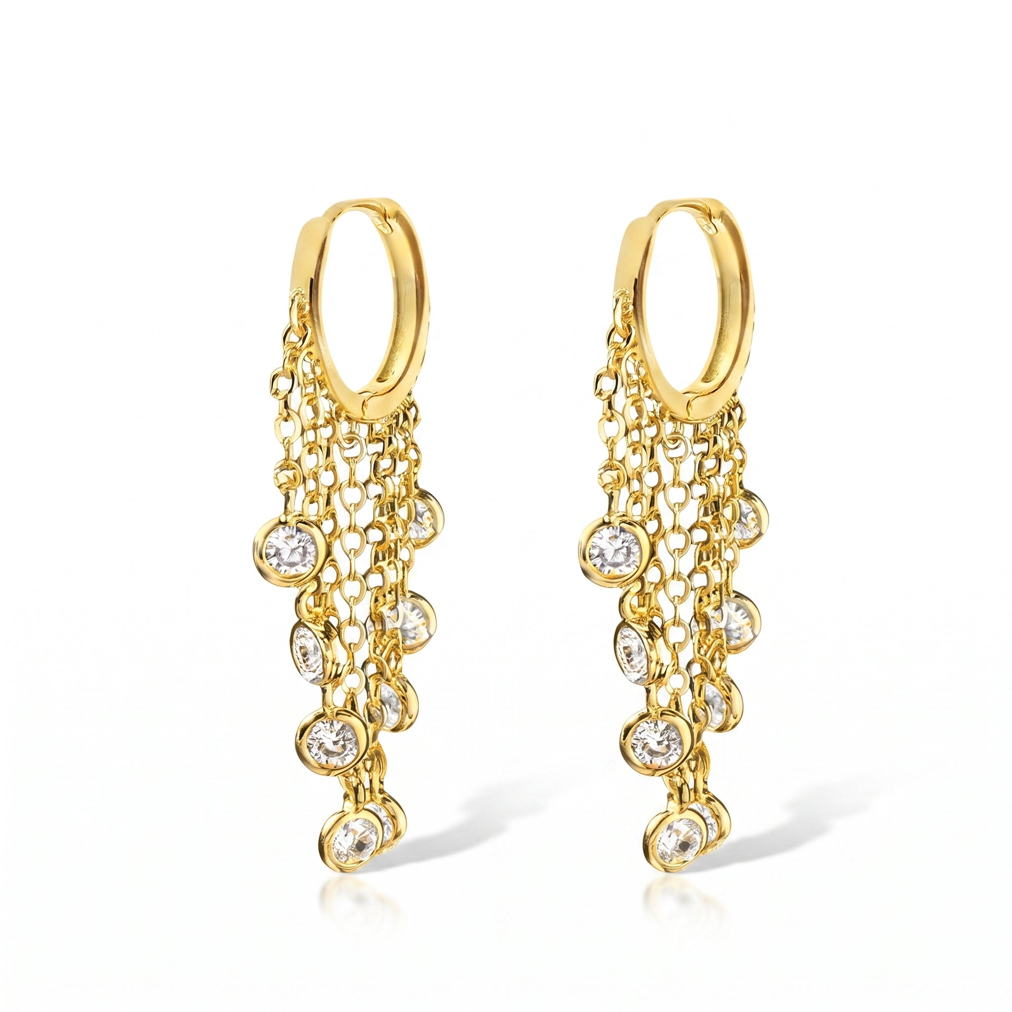 A pair of gold huggie hoop earrings with cascading chain links and clear round gemstones, shown on a clean white background.