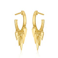 A pair of gold hoop earrings with dangling multi-pointed spike charms, shown on a clean white background with a subtle reflection.
